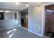 Open-concept living room featuring unique flooring with view into sauna at 802 Lewis St, Gastonia, NC 28054