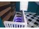 Unique staircase with custom wood accents and stylish purple lighting at 802 Lewis St, Gastonia, NC 28054