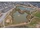 Aerial perspective of the community ponds, trails, and green spaces, promoting outdoor recreation at 83202 Cortland Dr, Lancaster, SC 29720