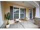 Cozy front porch with seating area, perfect for enjoying a morning coffee or afternoon tea at 83202 Cortland Dr, Lancaster, SC 29720