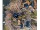 Aerial view of lakefront homes with private docks, lush tree coverage and surrounding neighborhood streets at 8749 Dog Leg Rd # 7, Sherrills Ford, NC 28673