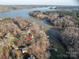 Aerial view of a lake community with tree coverage and lake access at 8749 Dog Leg Rd # 7, Sherrills Ford, NC 28673