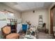 Unfinished basement space featuring an exercise bike and storage, offering potential for customization at 8749 Dog Leg Rd # 7, Sherrills Ford, NC 28673