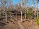 Cabin style house, surrounded by bare trees at 8749 Dog Leg Rd # 7, Sherrills Ford, NC 28673