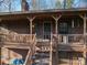 Close-up of the home's entrance, with stairs leading to a covered porch at 8749 Dog Leg Rd # 7, Sherrills Ford, NC 28673