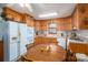 Bright kitchen featuring wooden cabinets, light countertops, and a breakfast nook at 8749 Dog Leg Rd # 7, Sherrills Ford, NC 28673