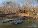 Lake house with a dock and beautiful waterfront scenery at 8749 Dog Leg Rd # 7, Sherrills Ford, NC 28673