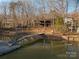 Waterfront house featuring a private dock and scenic water views at 8749 Dog Leg Rd # 7, Sherrills Ford, NC 28673