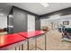 Finished basement area featuring neutral carpet, walk-out access, and bright overhead lighting at 8802 Glenside St, Huntersville, NC 28078