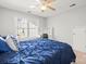 Comfortable bedroom with a workspace and a window for natural lighting at 8802 Glenside St, Huntersville, NC 28078