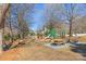 Community playground featuring slides, climbing structures, and picnic tables at 8802 Glenside St, Huntersville, NC 28078
