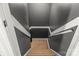 Carpeted stairwell with white rails and contrasting walls leading to the next level at 8802 Glenside St, Huntersville, NC 28078