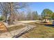 Community area featuring a volleyball court, a gazebo, seating and walking paths at 8802 Glenside St, Huntersville, NC 28078