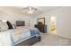 Cozy main bedroom with carpet, ceiling fan, and ensuite bathroom featuring double vanity at 920 Clementine Rd, Monroe, NC 28110