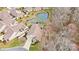 A stunning aerial view of the property, showcasing the serene pond and backyard at 1209 Waypoint Ct, Matthews, NC 28104