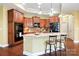 Modern kitchen with stainless steel appliances, custom cabinetry, and a center island at 1209 Waypoint Ct, Matthews, NC 28104