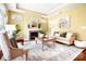 Well-lit living room with a fireplace, neutral paint, hardwood floors, and a comfortable seating arrangement, great for entertaining at 1209 Waypoint Ct, Matthews, NC 28104