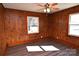 Wood-paneled bedroom featuring a window for natural light and vinyl flooring at 1433 Buffalo Shoals Rd, Catawba, NC 28609