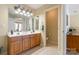 Bathroom featuring a double sink vanity with wooden cabinets, recessed lighting, and toilet at 14622 Greenpoint Ln, Huntersville, NC 28078