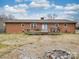 Backyard with deck attached to a brick house at 1525 Oakridge Dr, Salisbury, NC 28146