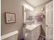This lovely bathroom has a clean, updated vanity, neutral decor, and modern fixtures at 1525 Oakridge Dr, Salisbury, NC 28146