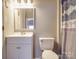 Cozy bathroom with white vanity, updated fixtures, and neutral color scheme at 1525 Oakridge Dr, Salisbury, NC 28146