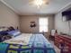 Comfortable bedroom with ceiling fan and natural light at 1525 Oakridge Dr, Salisbury, NC 28146