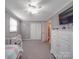 This bedroom offers carpeted flooring, ceiling fan, and plenty of space for a bedroom at 1525 Oakridge Dr, Salisbury, NC 28146