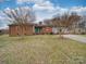 Charming single-story home with brick and vinyl siding and a well-maintained front lawn at 1525 Oakridge Dr, Salisbury, NC 28146