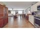 Open-concept living and dining areas with hardwood floors and plenty of natural light at 1525 Oakridge Dr, Salisbury, NC 28146