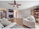 Spacious living room with fireplace, wood-look floors and large windows, ideal for entertaining at 1525 Oakridge Dr, Salisbury, NC 28146