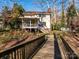 Charming backyard and bridge leading to this two-story home at 1590 Daybreak Ridge Rd, Kannapolis, NC 28081