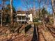 Charming home with a bridge to the backyard and a lovely porch at 1590 Daybreak Ridge Rd, Kannapolis, NC 28081