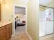 Bright bathroom featuring a glass-enclosed shower and a glimpse into the adjoining bedroom at 1590 Daybreak Ridge Rd, Kannapolis, NC 28081