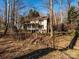 Home surrounded by mature trees and nature at 1590 Daybreak Ridge Rd, Kannapolis, NC 28081