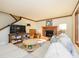 Comfortable living space with a fireplace, wooden trim, and a neutral color palette at 1590 Daybreak Ridge Rd, Kannapolis, NC 28081
