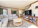 Bright living room featuring an open layout, plush seating, and warm wood trim at 1590 Daybreak Ridge Rd, Kannapolis, NC 28081