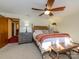 Bright primary bedroom with a ceiling fan, and an entrance to an adjacent room at 1590 Daybreak Ridge Rd, Kannapolis, NC 28081