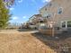 Exterior view of a well-maintained backyard with lawn and fence at 1630 Sassafras Ct, Fort Mill, SC 29715