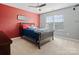 Cozy bedroom features a ceiling fan, a window with blinds, and gray and red walls at 1630 Sassafras Ct, Fort Mill, SC 29715