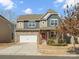 Charming two-story home featuring a stone facade, attached garage, and well-maintained landscaping at 1630 Sassafras Ct, Fort Mill, SC 29715