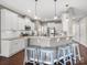 Bright kitchen with stainless steel appliances, center island, and eat-in bar with seating at 1630 Sassafras Ct, Fort Mill, SC 29715