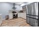 Well-lit kitchen with stainless steel appliances, and wooden floors, creating a modern design at 1630 Sassafras Ct, Fort Mill, SC 29715