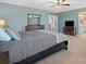 Comfortable main bedroom with bed, dresser, and TV, creating a private retreat at 1630 Sassafras Ct, Fort Mill, SC 29715