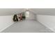 Spacious attic featuring carpeted floors and neutral walls at 164 Lake Commons Dr, Rock Hill, SC 29732