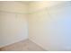 Walk-in closet featuring shelving providing storage solutions for clothing and accessories at 203 Makayla Ct, Fort Mill, SC 29715