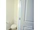 Clean half bathroom with a classic toilet and fresh white paint, conveniently located near the living areas at 203 Makayla Ct, Fort Mill, SC 29715