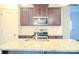 Well-equipped kitchen with granite countertops, stainless steel appliances, and plenty of cabinet space at 203 Makayla Ct, Fort Mill, SC 29715