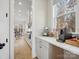 Charming kitchen with sleek countertops and cabinets, offering a view into the dining area at 2127 Nims Village Dr, Fort Mill, SC 29715