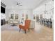Inviting living room showcasing a fireplace, hardwood floors, and an open floor plan at 2127 Nims Village Dr, Fort Mill, SC 29715